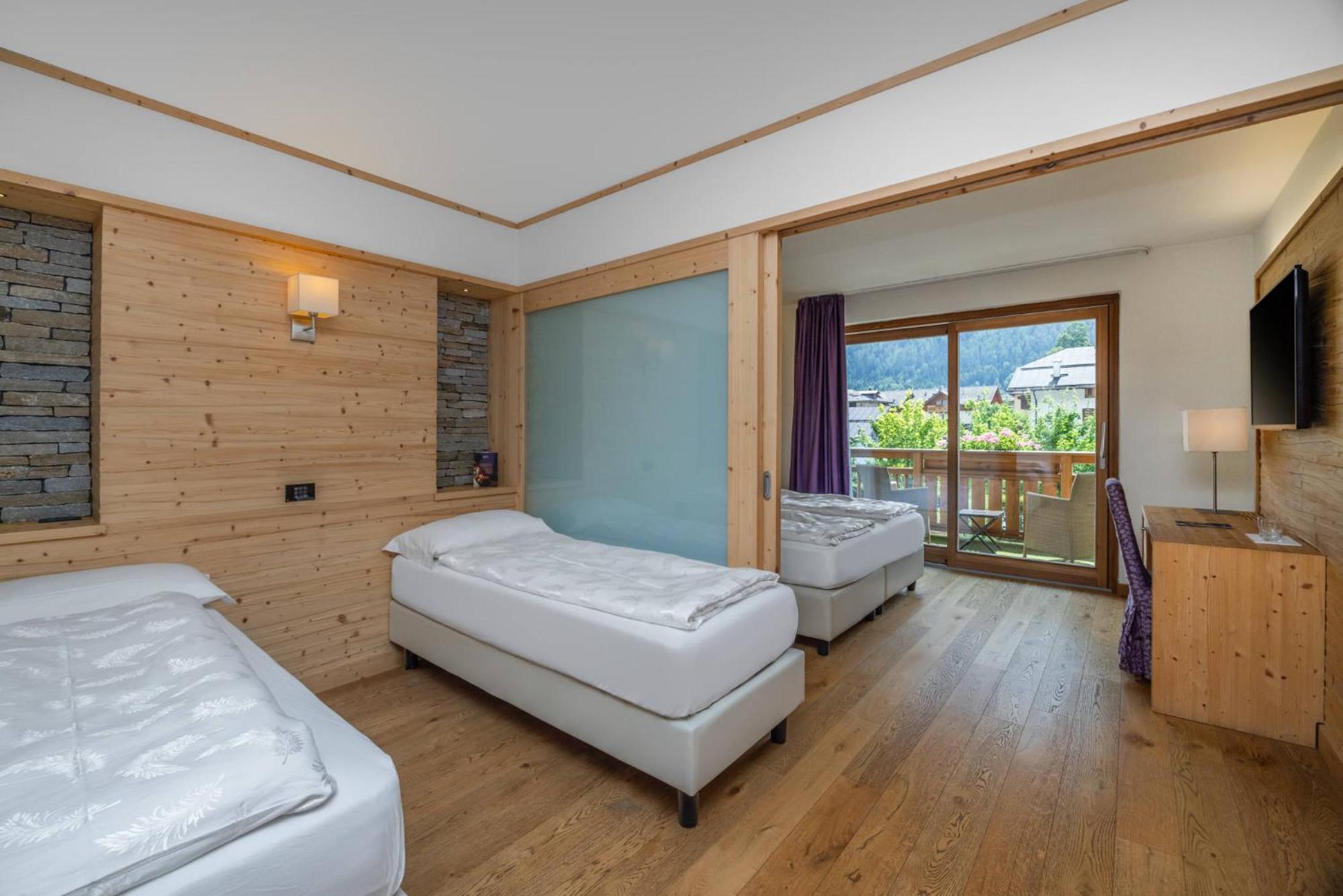 Alpholiday Dolomiti Wellness & Family Hotel Dimaro Room photo